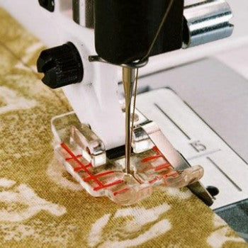 Husqvarna Viking Clear ¼” Piecing Foot with guide from Jaycotts Sewing Supplies